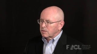 What are the controversies over the meaning of justification by faith alone?