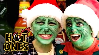 Two Grinches Take On The Hot Ones Gauntlet