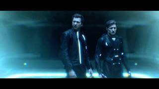 Tron: Legacy - Tron fights to save Kevin Flynn.