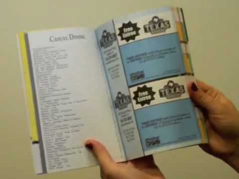 flipping pages in an Attractions coupon book