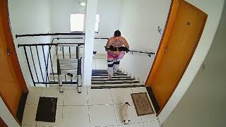 Man's Pants Drop On Stairs While Carrying His Cat