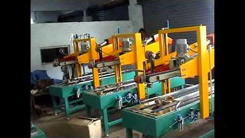 AUTO FLAP CLOSING AND  CARTON TAPPING MACHINE