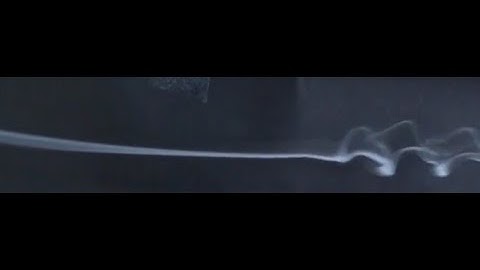 Transition to turbulence in a smoke jet