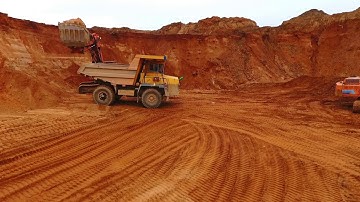 dumper truck moving at sand mine drone view of mining truck working at sand quarry dump