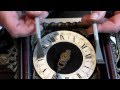 How to remove the clock work from a zaandam clock from the case.