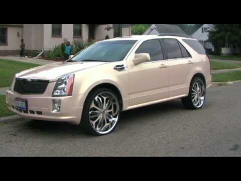 Cadilac srx on 24s & 30's one of a kind havent seen one yet...