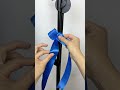 How to Tie a Perfect, Symmetry-Defying Ribbon Bow