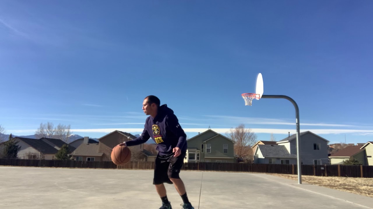 Teaching how to go under the leg with the basketball YouTube