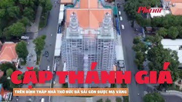 Cặp Thánh giá mới trên đỉnh tháp Nhà thờ Đức Bà Sài Gòn được mạ vàng | Báo Phụ Nữ