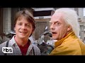 Doc Brown and Marty McFly Arrive in the Future (Clip) | Back to the Future Part II | TBS