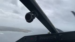 Extra 400 island landing in heavy winds - cockpit view