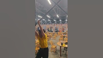 Wild Footage Shows People Holding Onto Canopy During Storm