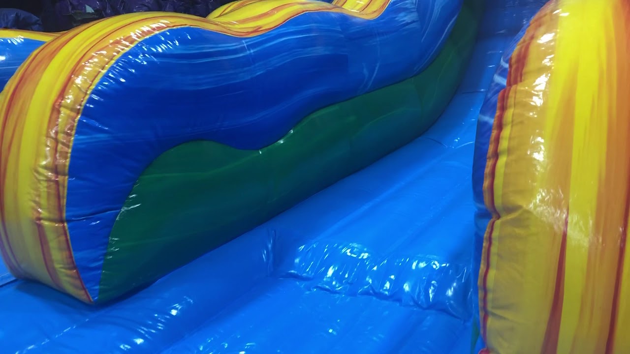 Hulk Double lane water slide with bounce house rental New Orleans LA