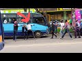 Two Matatu bus drivers fight in the middle of Nairobi city CBD, Kenyatta Avenue.