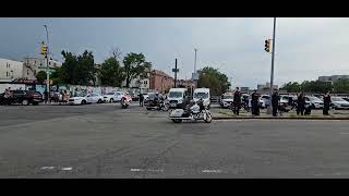 Multi Agency Motorbike Escort Passing By On White Plains Road In Parkchester, The Bronx, New York 