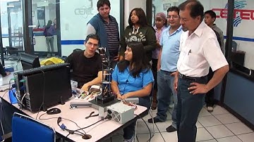 Control de un brazo mecánico con Visual Basic .NET por medio del puerto USB y PIC18f4550