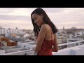 Elegant fashion girl in red dress on a rooftop in Valencia at sunset sunrise - Stock Footage