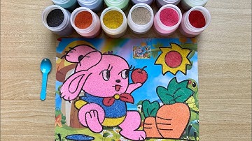Tô tranh cát hình chú thỏ và củ cà rốt. Sand painting bowl in the shape of a rabbit and carrot