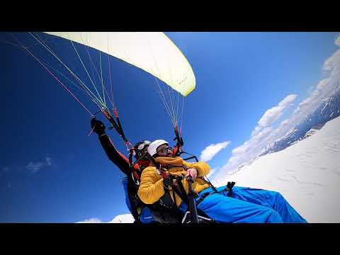 პარაპლანით ფრენა გუდაურში /Tandem Paragliding in Gudauri
