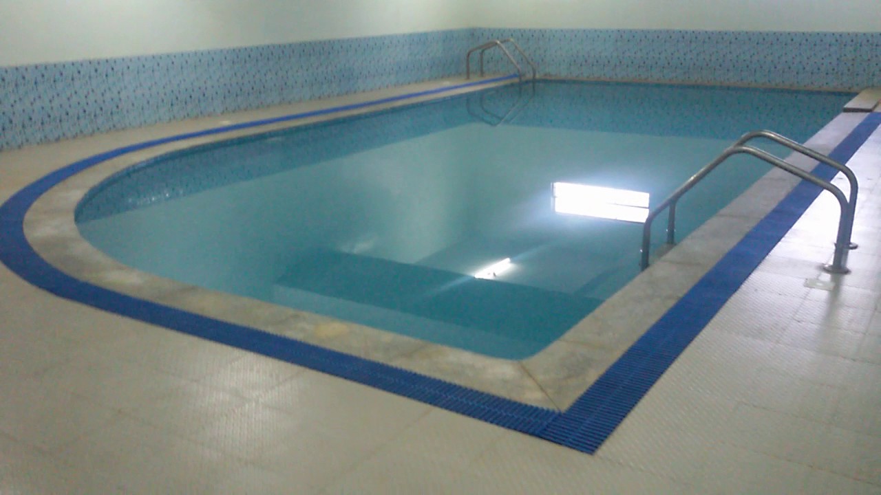 WATERPEPPER POOLS PROJECT,OVERFLOW TYPE BELOW PODIUM LEVEL SWIMMING POOL.NIKETHAN HERITAGE,HUBLI
