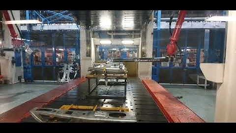 COMAU press automation implemented by RBS Robotics