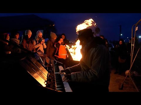 In Poland, a pianist plays to "spread peace through music".