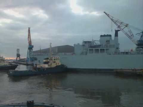 RFA Argus being towed into dry dock on river Tyne