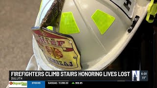 Local first responders walk stairs of AMSOIL honoring fallen firefighters from 9/11