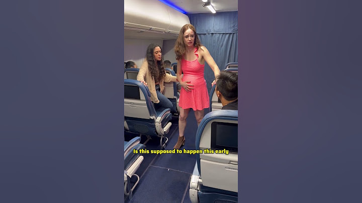 Pregnant Woman's Water breaks on Airplane part 1