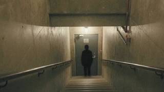 FILE_0004.3gp — something is standing at the bottom of the stairs