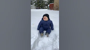Baby talking in snow