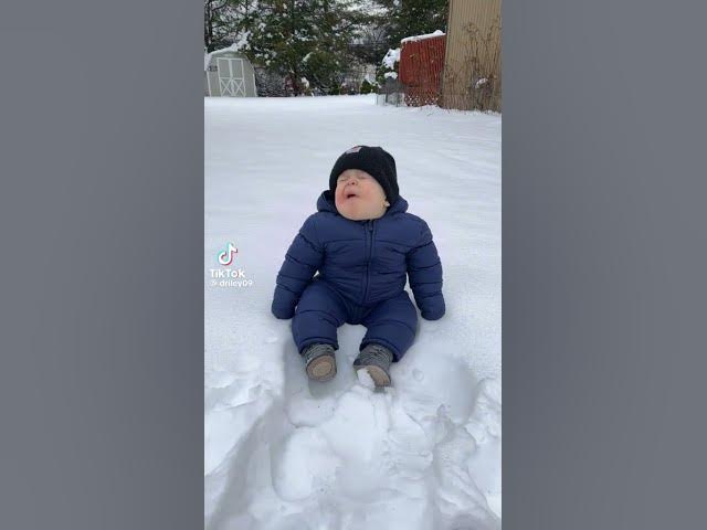 Baby talking in snow