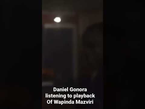 Daniel Gonora listening to playback of Wapinda Mazviri