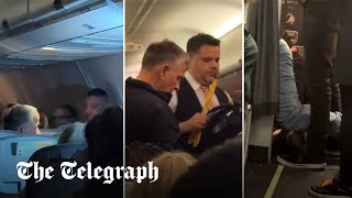 video: Watch: Unruly passenger hauled off Manchester-Turkey flight after mid-air altercation