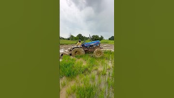 Powertrac 4wd tractor working in mud #shorts #trending #tractor