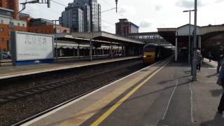 Green GWR HST speeds past Slough at 125
