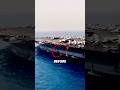Why does an aircraft carrier need to drain water before setting sail?#military