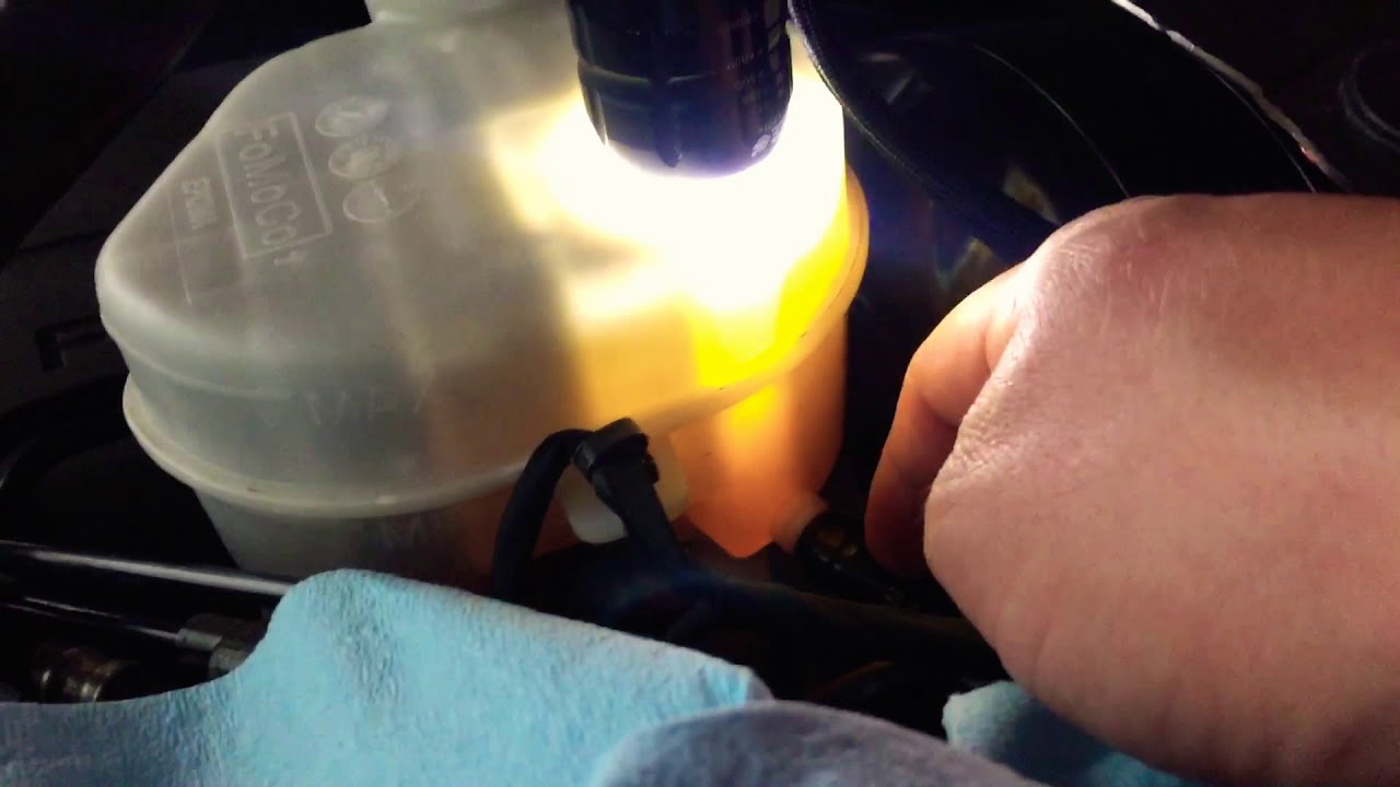 Vacuum to brake/clutch reservoir. Reservoir to master cylinder line