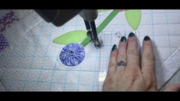 Quilting around appliqué and crosshatching