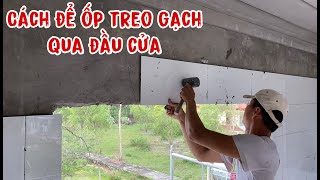 cách ốp treo gạch bằng thép đi qua đầu cửa rất hay