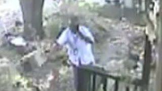 Postal worker throws package on porch