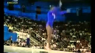 Balance Beam Side Stand Jump to Split with Body Arched and Head Dropped Gymnastics Video