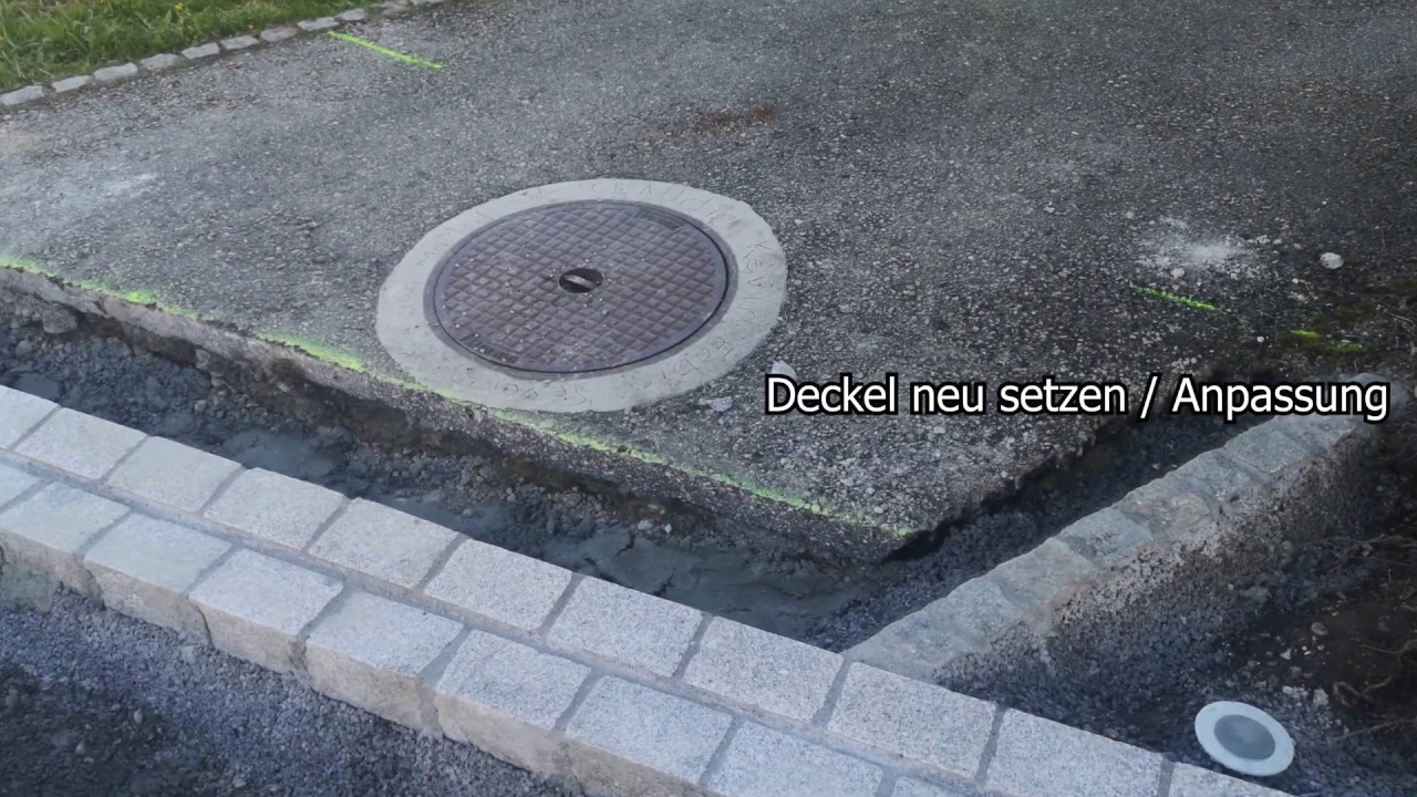 Поместите крышку люка