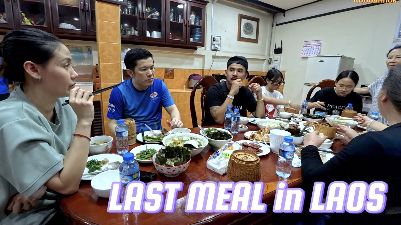 A dinner for the American going back home. Eating Lao traditional food together