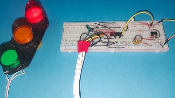 Traffic signal circuit using NE 555 and CD 4017