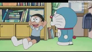 DORAEMON MALAY(SEORANG DIRI DI MASA DEPAN)DAN(JAM BERJADUAL)