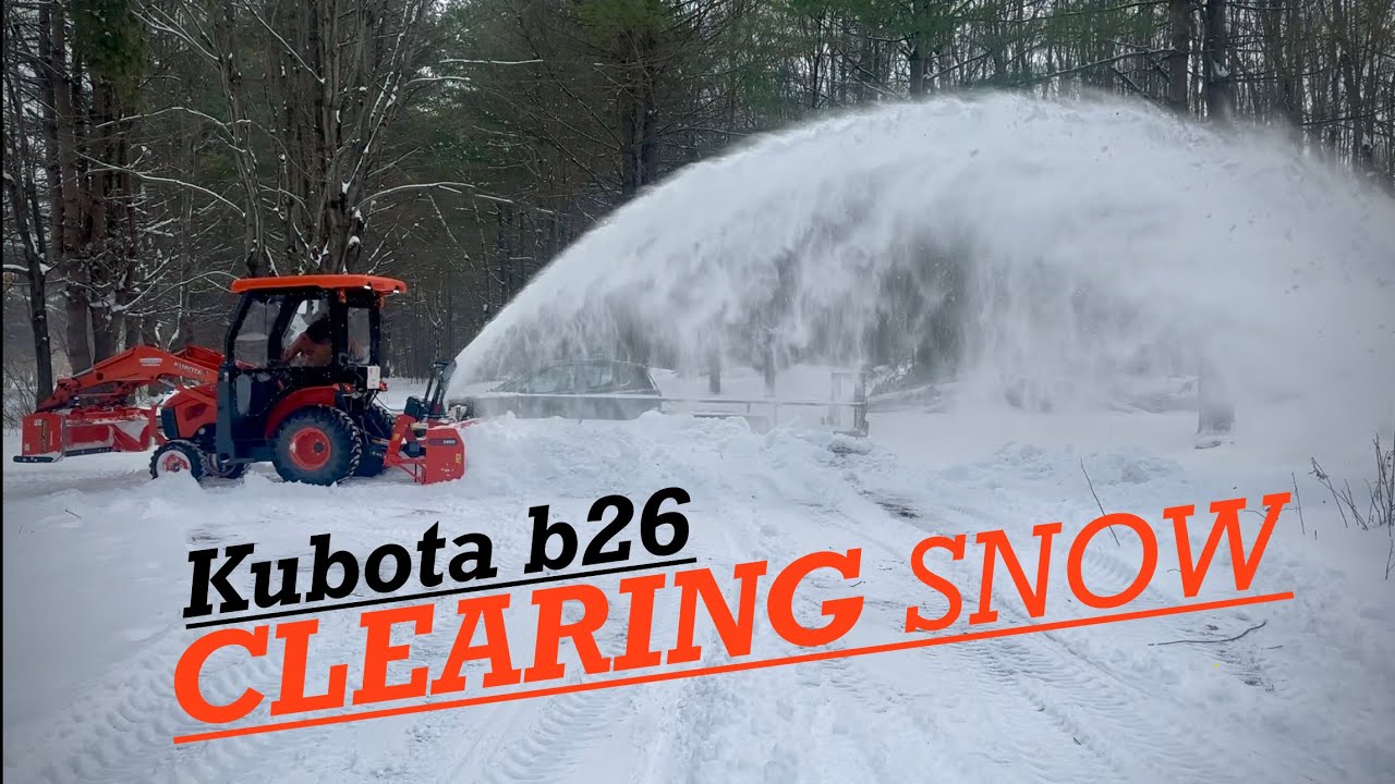 Kubota B26 snowblowing