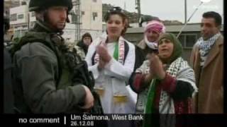 Wedding protest at separation barrier in the West Bank Wedding protest at separation barrier in the West Bank