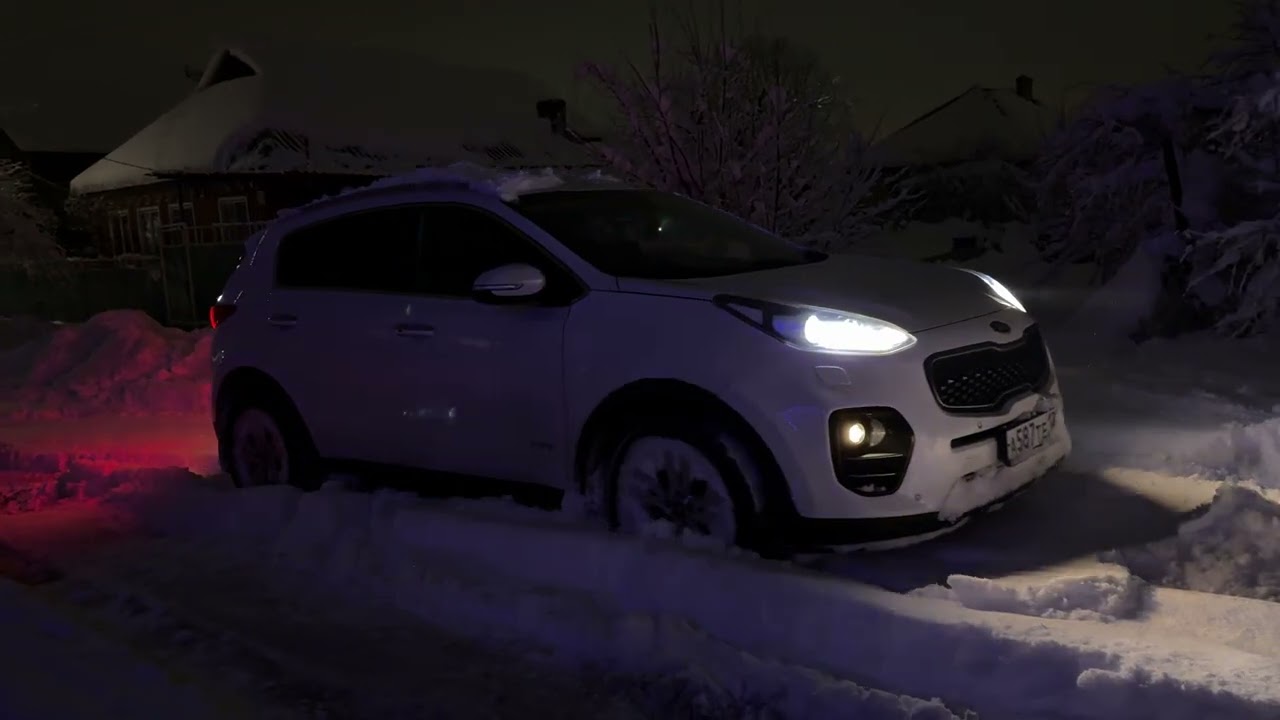 На летней резине по снегу Kia Sportage
