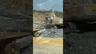 Monster excavator pc850 loading CAT 770G..35TN
